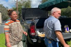 Dina and James Paul Men prepare fish October 10, 2021