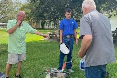 Men of the church preparing food for fish fry October 10, 2021