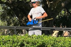 Youth Mission Week community service and church grounds cleanup